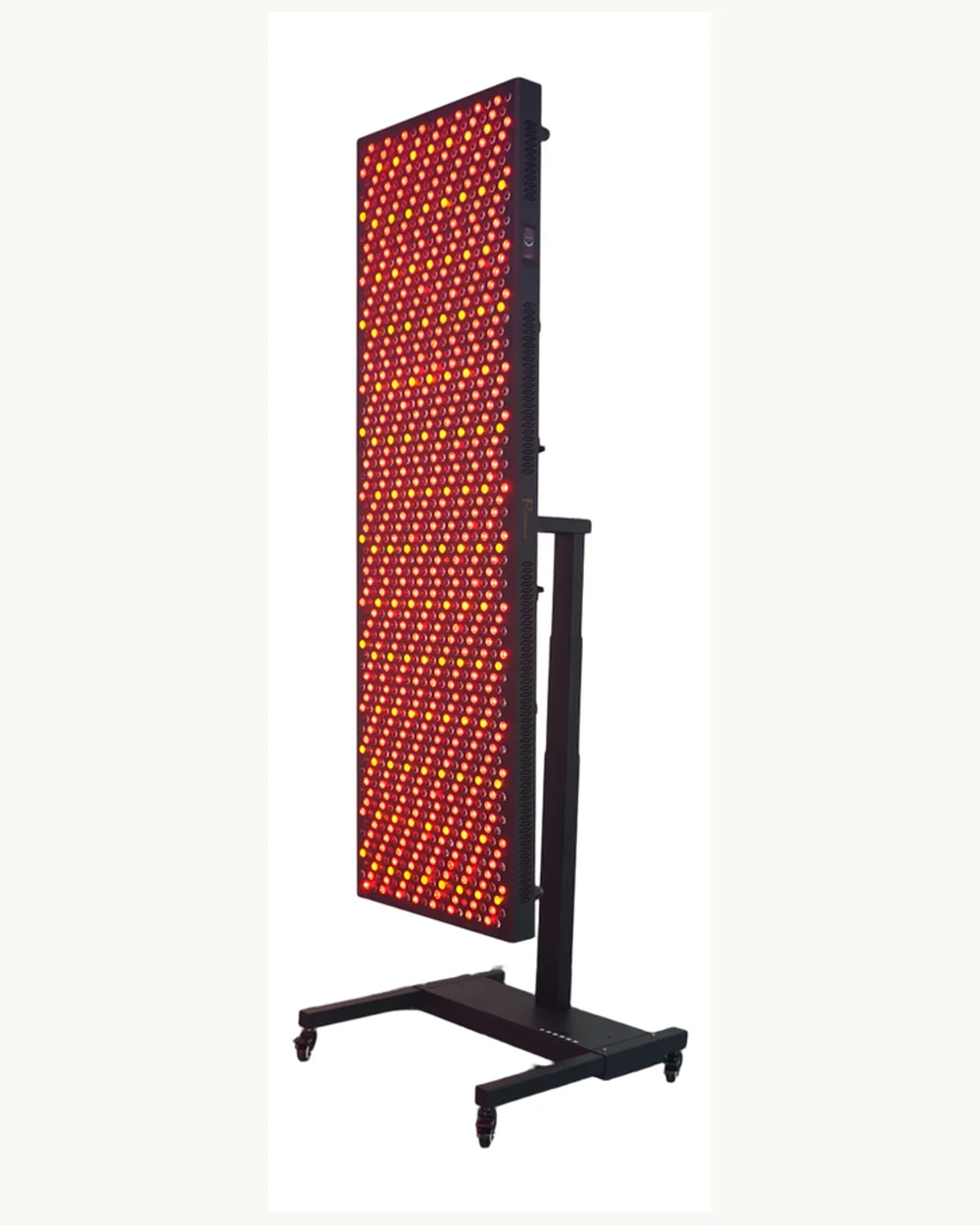 The Rinnovare R-1000 full-body red light panel standing upright in a dark studio.